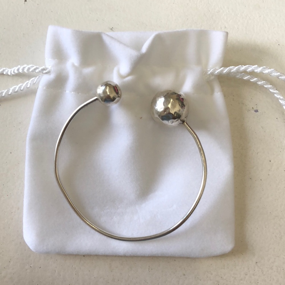 Sterling Silver Bracelet with hammered ends.